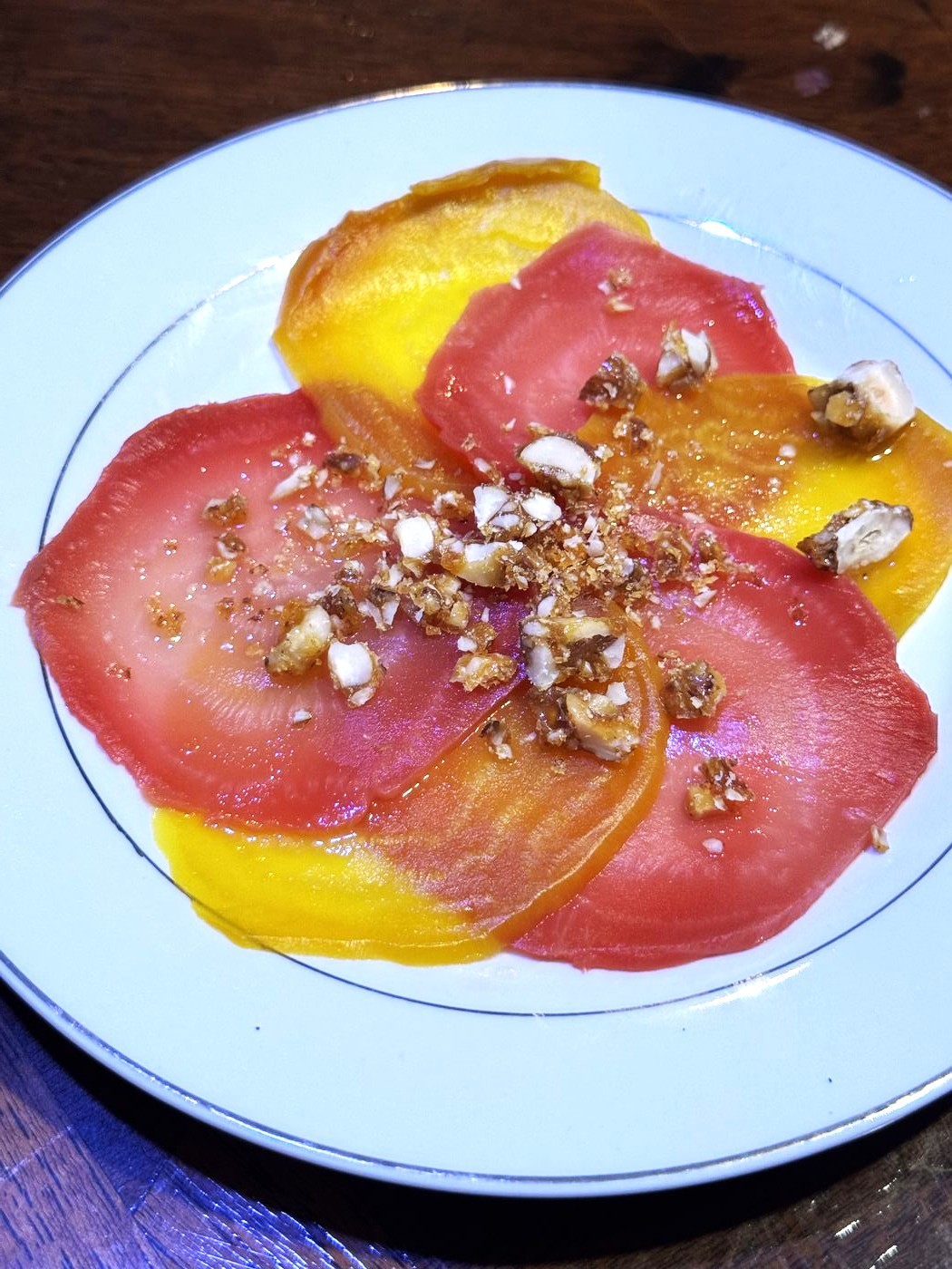 Heirloom beet carpaccio with toasted hazelnuts
